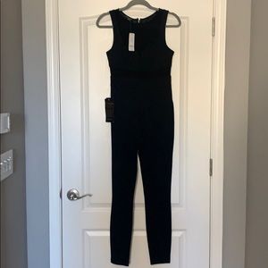 Brand new black BEBE jumpsuit